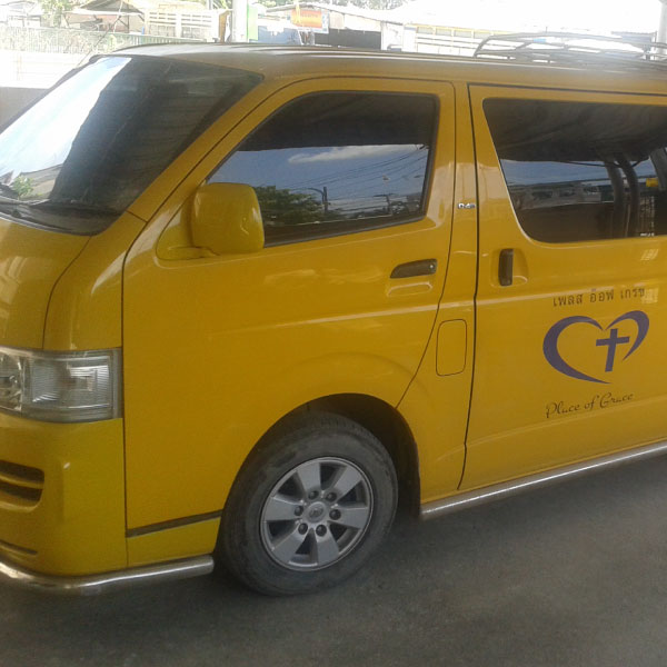 Place of Grace Charity Bangkok Thailand yellow minibus
